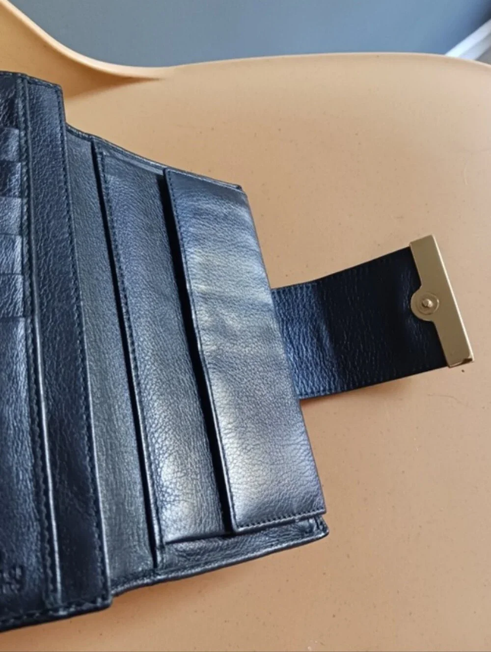 Gucci Black Embossed GG Leather Wallet with Gold Plate